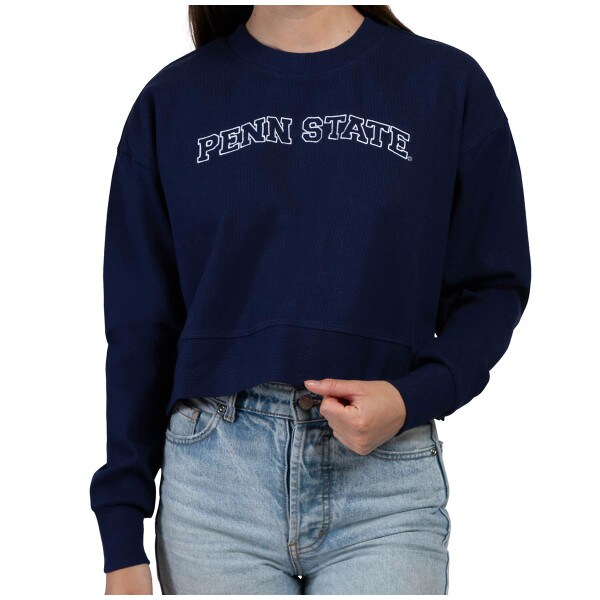 model wearing women's navy crew sweatshirt with stitched Penn State across chest